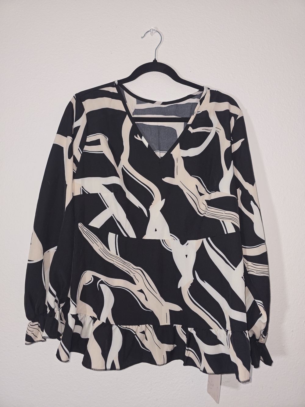 Black & Cream Abstract V-Neck Peplum Tunic